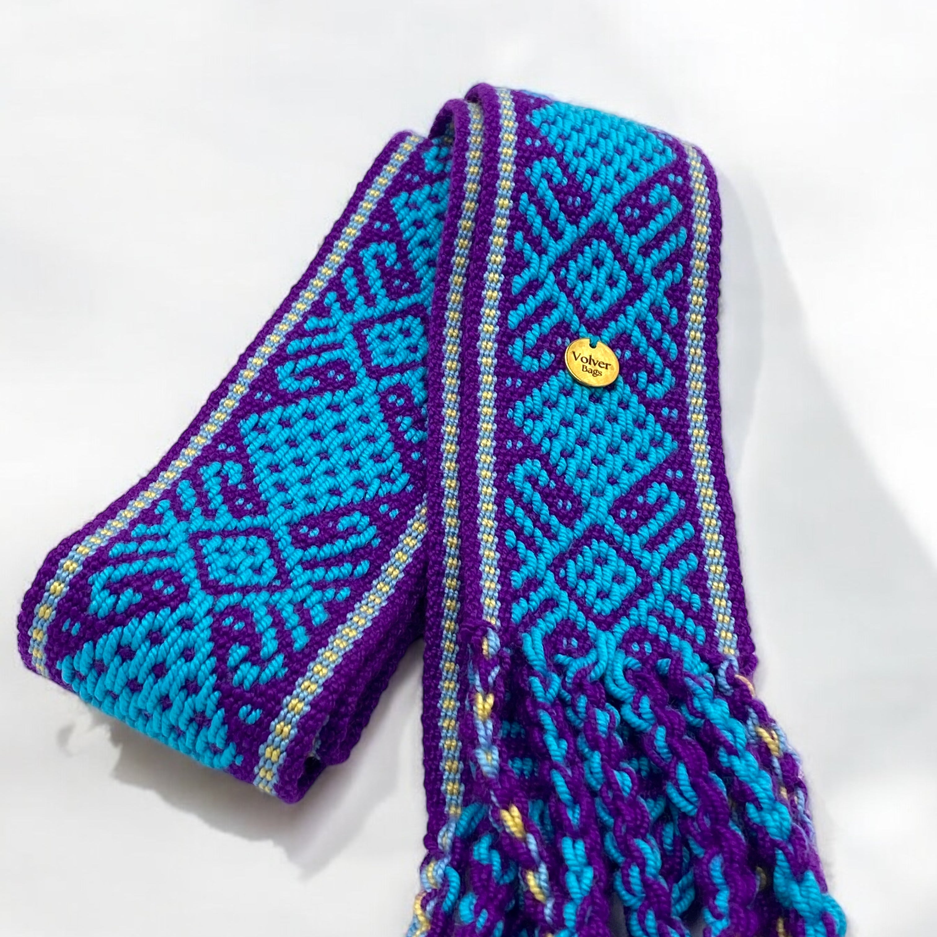 Frange intrecciate a mano su cintura etica sostenibile Volver Bags – artigianato colombian