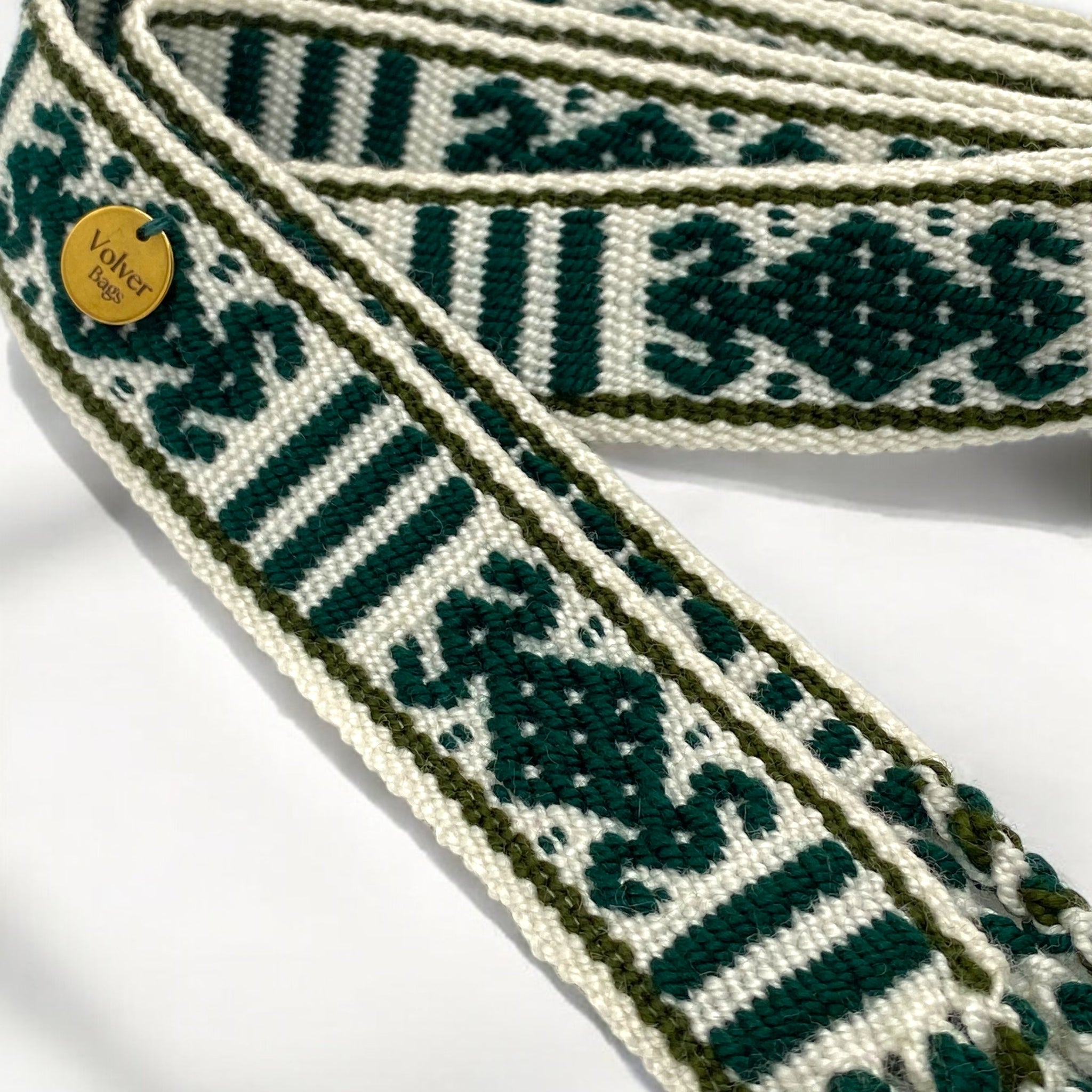 Cintura artigianale tessuta a mano in cotone, colori beige, arancio e nero, realizzata da artigiane colombiane