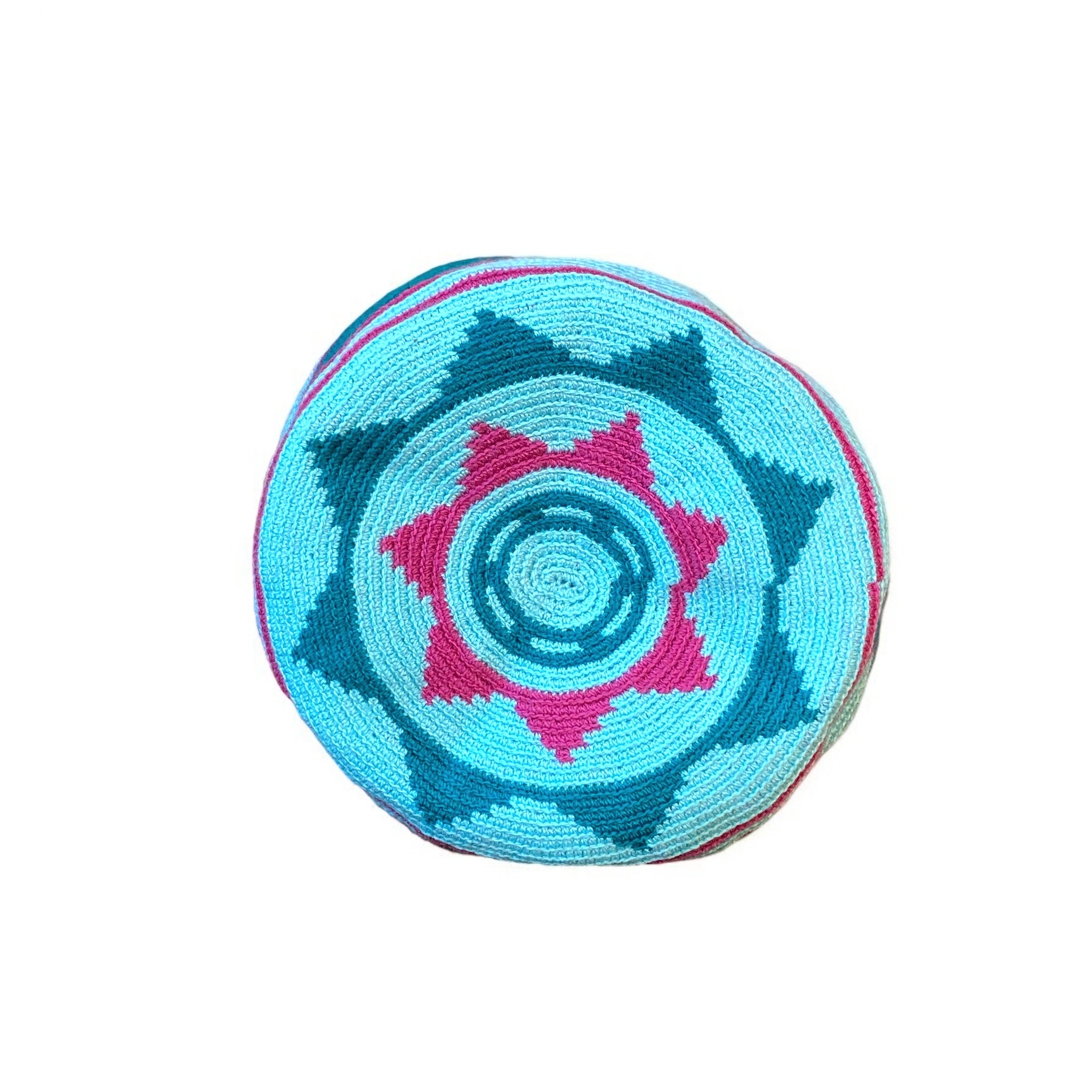 Dettaglio base della Mochila Lopez - artigianale in toni turchese, ottanio e rosa. Motivi geometrici, triangoli