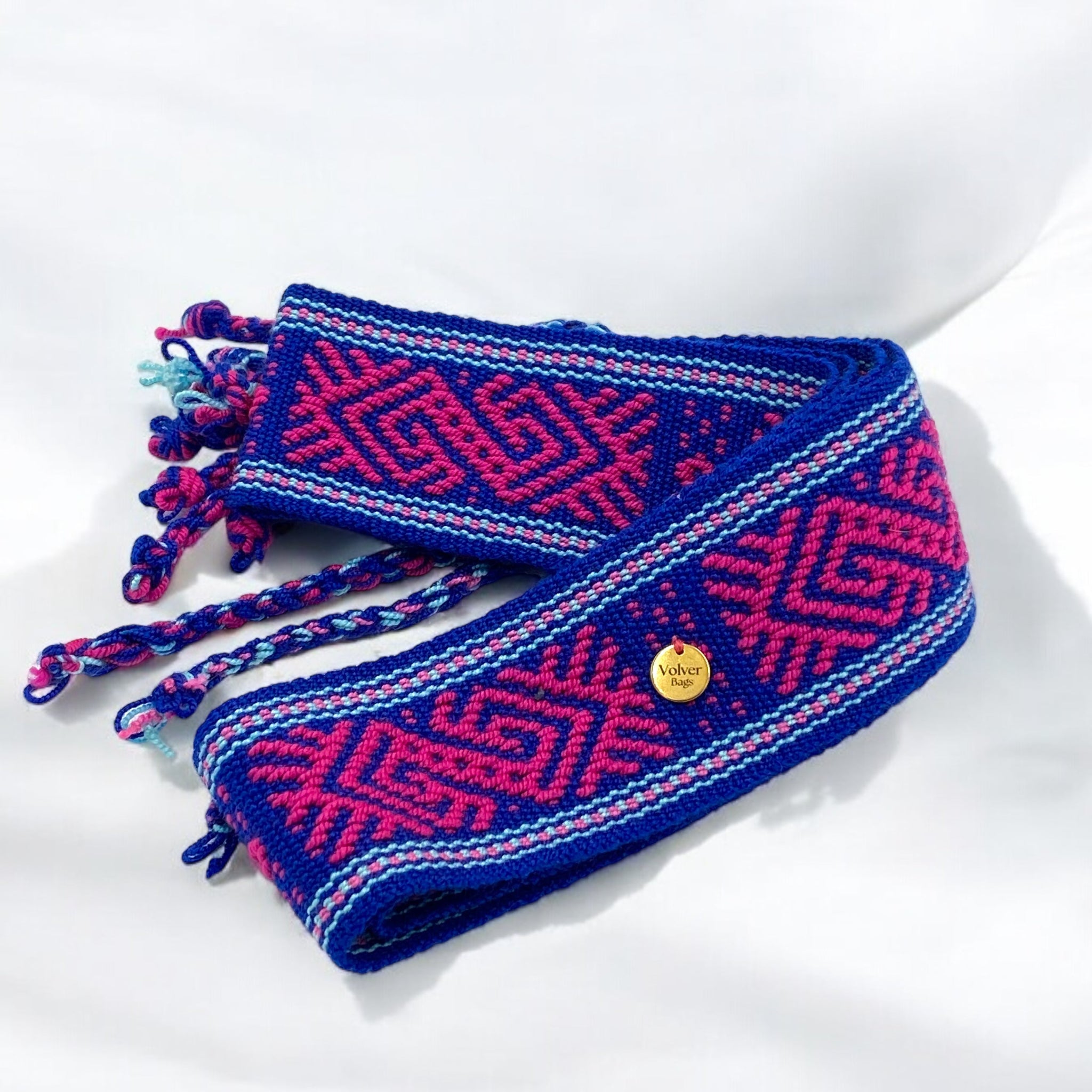 Cintura artigianale tessuta a mano in cotone, colori blu, rosa e azzurro, realizzata da artigiane colombiane