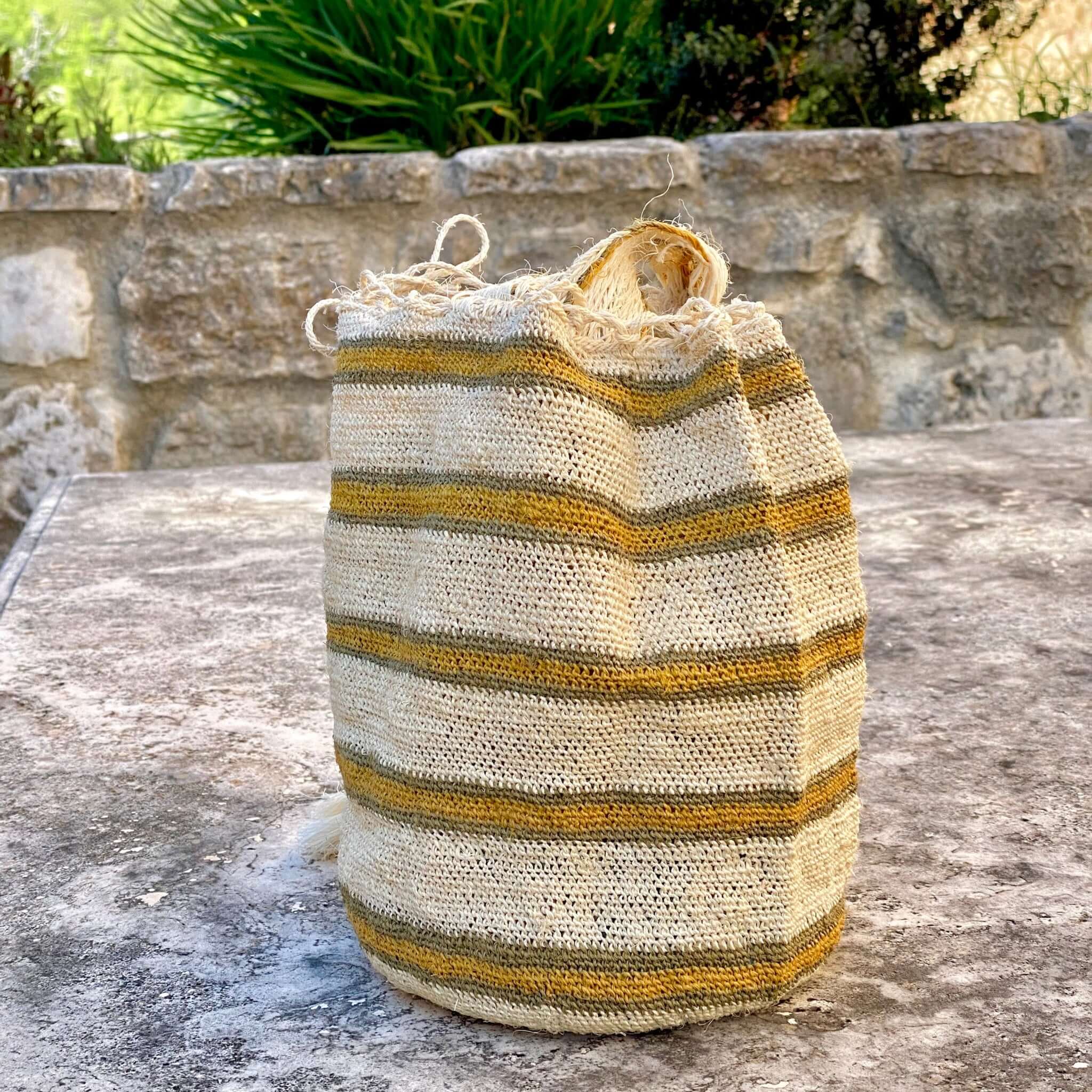 FIBI Bag Madrid woven from 100% natural fique fiber, featuring beige and green stripes, eco-friendly and artisan-made.