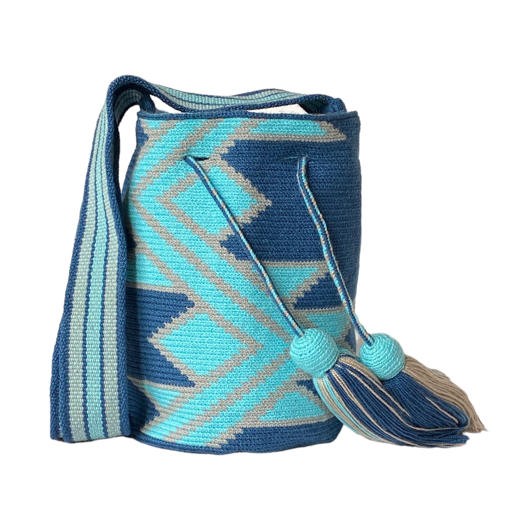Borsa Wayuu piccola Calipso Volver Bags in turchese, blu oceano e sabbia, fatta a mano in Colombia
