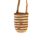 
Borsa Volver Bags a righe avorio e miele chiaro, realizzata a mano con materiali sostenibili.
