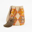Borsa artigianale, realizzata a uncinetto con motivi geometrici autunnale nei toni arancio, tortora e ocra – Volver Bags

