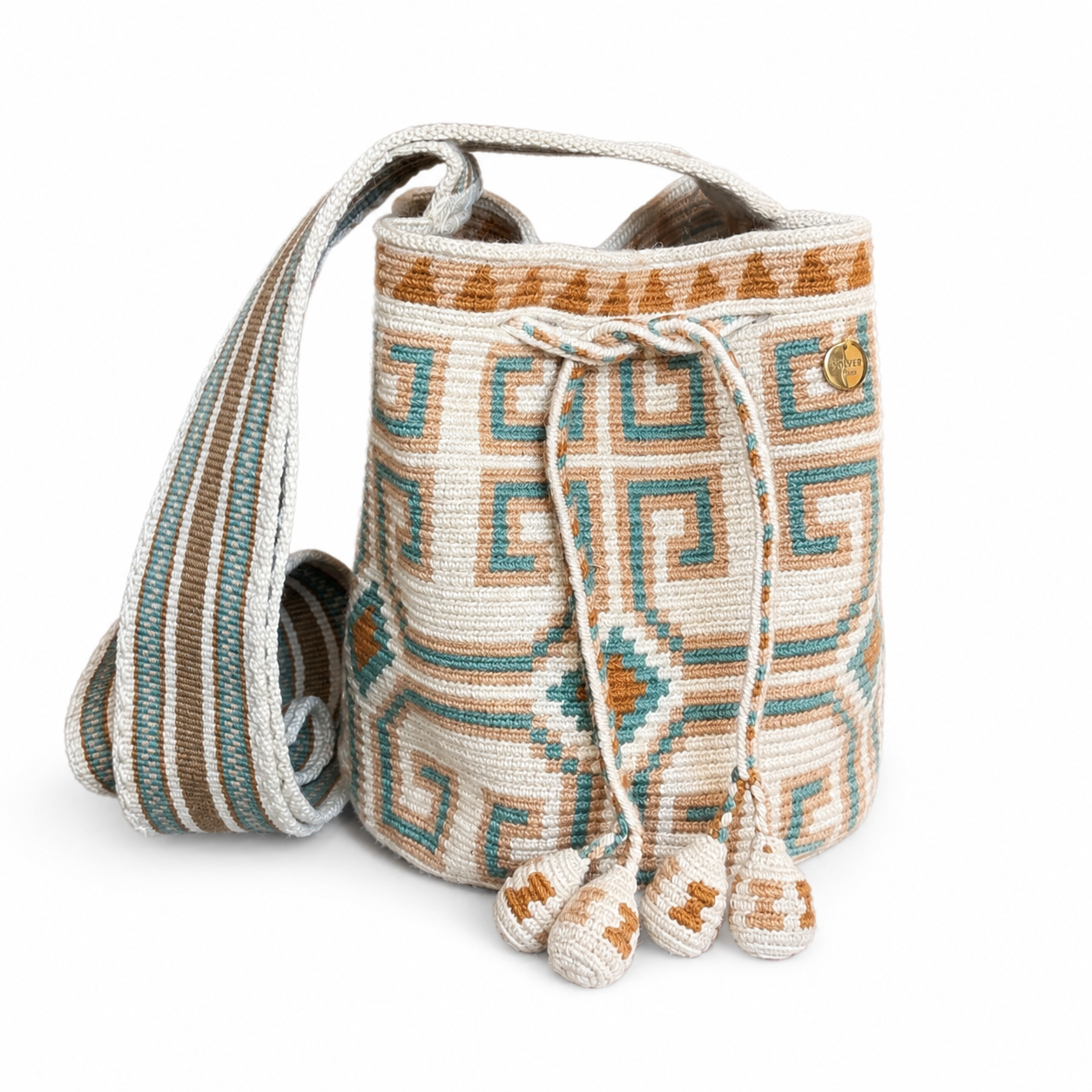 Estelita Capri Volver Bags, borsa artigianale realizzata a mano con motivi geometrici turchese e caramello su fondo avorio